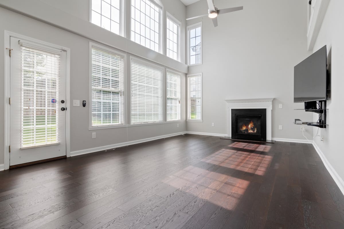 TV mounted too high above fireplace